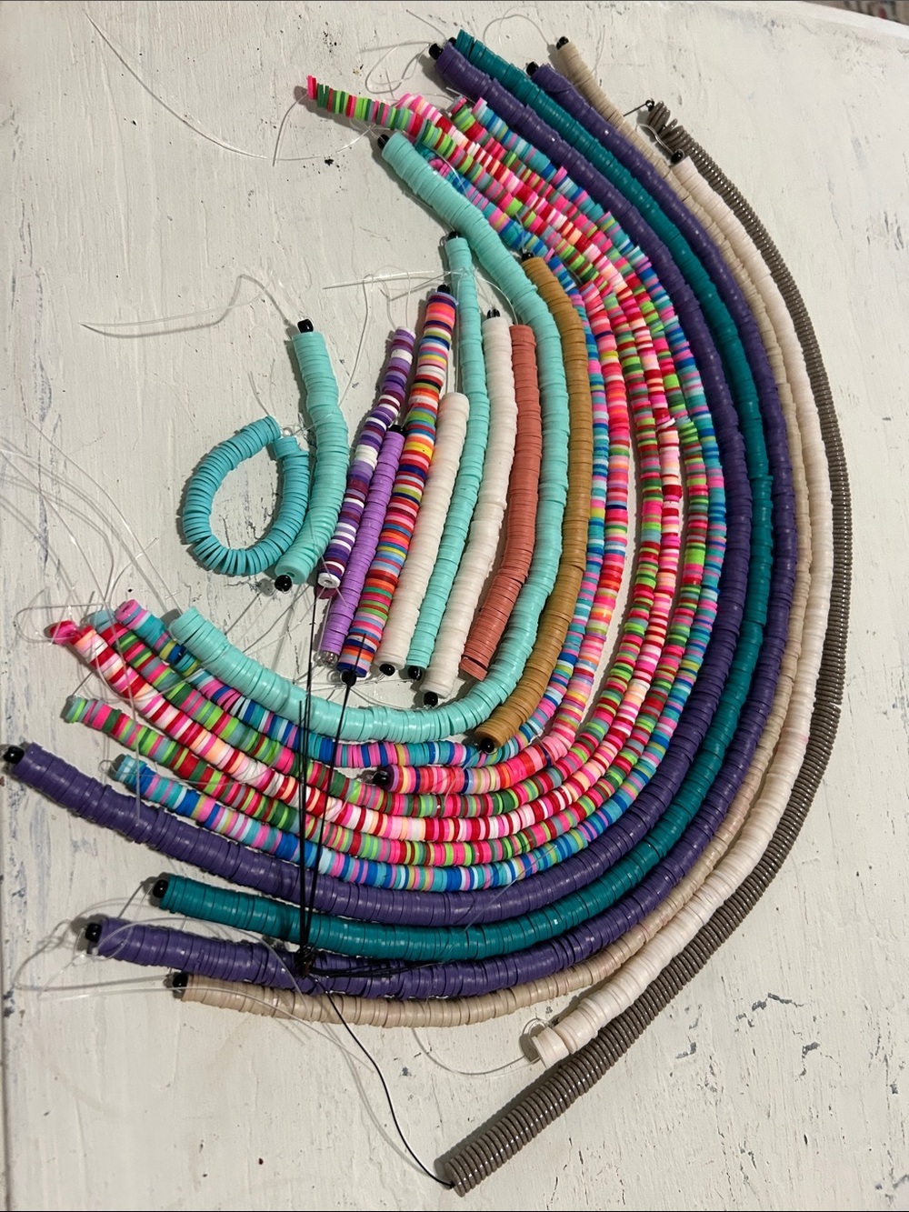 Colorful Multi-Strand Polymer Disk Beads